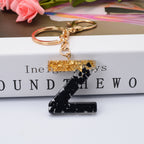 Carsine Black Pompom 26 Alphabets Keychain gold / Z